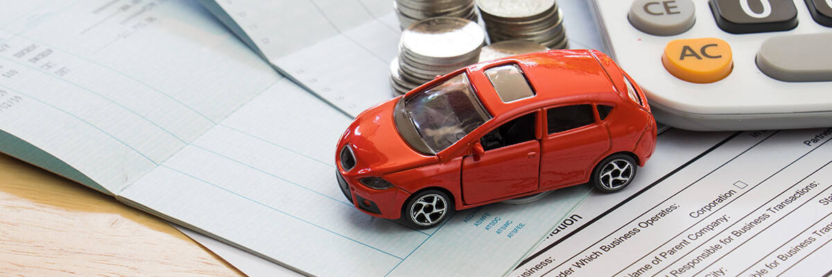 toy car on paperwork